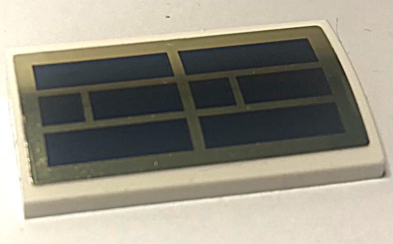 Slope, Curved 2 x 4 x 2/3 with Bottom Tubes with Dark Blue and Gold Solar Panel Pattern (Sticker) - Set 60350