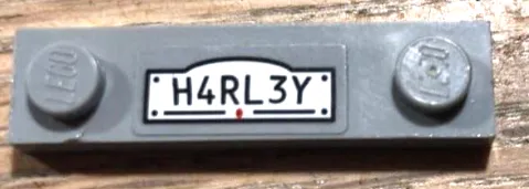 Plate, Modified 1 x 4 with 2 Studs without Groove with 'H4RL3Y' Pattern (Sticker) - Set 70921