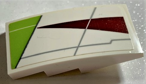 Slope, Curved 4 x 2 with SW Lime Triangle and Dark Red Triangle Pattern Model Left Side (Sticker) - Set 75191