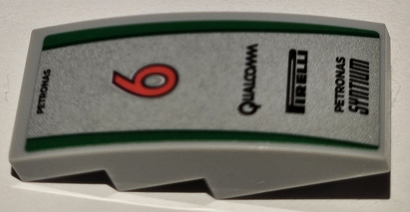 Slope, Curved 4 x 2 with Black 'QUALCOMM', 'PIRELLI', and 'PETRONAS SYNTIUM', Red Number 6 and Green Stripes on Silver Background Pattern (Sticker) - Set 75883