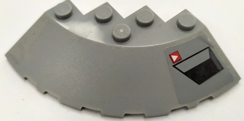 Brick, Round Corner 6 x 6 with Slope 33 Edge, Facet Cutout with Black Vent and White Triangle on Red Square Pattern Model Left Side (Sticker) - Set 75150