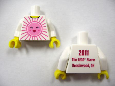 Torso Shirt with Bright Pink and Dark Pink Sun with Face with Red Open Mouth Smile, Yellow Neck, '2011 The LEGO Store Beachwood, OH' on Back Pattern / White Arms / Yellow Hands