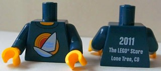 Torso Shirt with White Sailboat over Red Concentric Circles Sun, Yellow Neck, '2011 The LEGO Store Lone Tree, CO' on Back Pattern / Dark Blue Arms / Yellow Hands