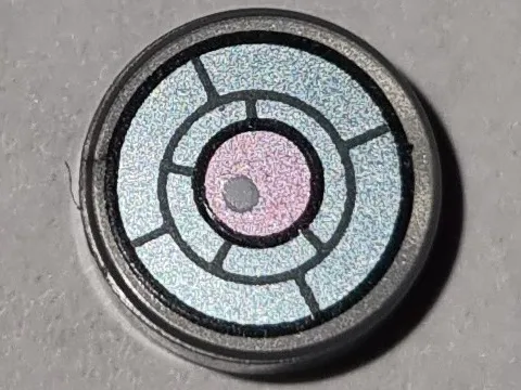 Tile, Round 1 x 1 with Black, Dark Bluish Gray and Metallic Light Blue X-Ray Goggles with Metallic Pink Eye and White Glint Pattern