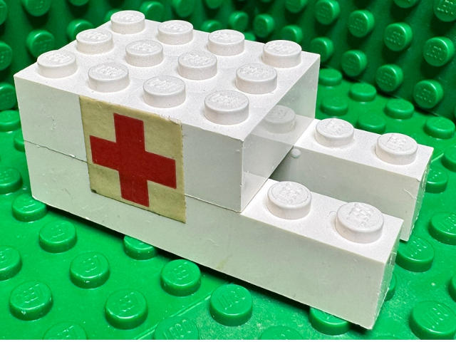 Stickered Assembly 6 x 3 x 2 with Red Cross Pattern on Both Sides (Stickers) - Sets 460-1 / 653-1 - 2 Brick 1 x 6, 2  Brick 2 x 3 without Cross Supports
