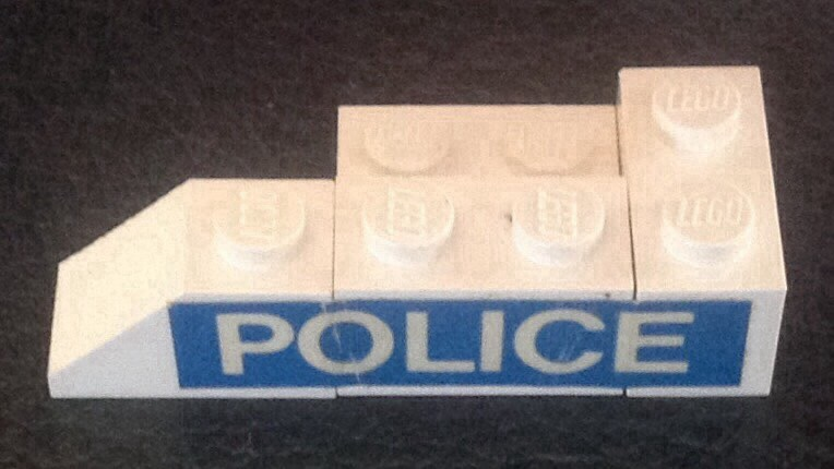 Stickered Assembly 5 x 2 x 1 with 'POLICE' Pattern Model Right Side (Sticker) - Set 394 - 1 Brick 1 x 2, 2 Plate 2 x 2, 1 Plate 1 x 2, 1 Slope 2 x 1