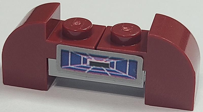 Stickered Assembly 4 x 1 x 1 1/3 with Blue Target Screen Pattern (Sticker) - Set 7676 - 1 Plate 1 x 2, 2 Slope, Curved 2 x 1 x 1 1/3 with Recessed Stud