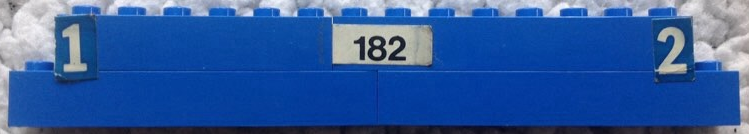 Stickered Assembly 16 x 1 x 2 with White Number 1 and 2 and Black 182 Pattern Model Left Side (Stickers) - Set 182 - 1 Brick 1 x 6, 3 Brick 1 x 8