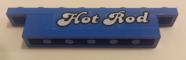 Stickered Assembly 8 x 1 x 1 1/3 with White 'Hot Rod' Pattern Model Right Side (Sticker) - Set 5541 - 1 Brick 1 x 6, 1 Plate 1 x 8