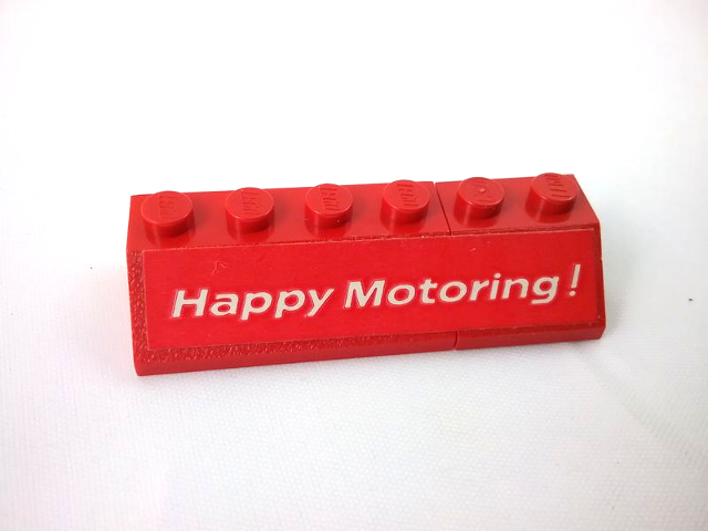 Stickered Assembly 6 x 2 x 1 with 'Happy Motoring !' Pattern Model Left Side (Sticker) - Set  554 - 1 Slope 45 2 x 2, 1 Slope 45 2 x 4