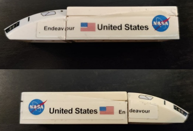 Stickered Assembly 6 x 2 x 1 with 'Endeavour', 'United States', Flag and NASA Logo Pattern on Both Sides (Stickers) - Set 7467 - 1 Slope, Curved 2 x 2 Lip with Space Shuttle Pattern, 2 Plate 2 x 4, 2 Tile 1 x 4