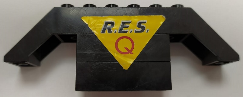 Stickered Assembly 10 x 2 x 3 with Black 'R.E.S.' and Red 'Q' (Res-Q) on Yellow Triangle Pattern (Sticker) - Set 6479 - 1 Slope 45 10 x 2 x 2 Double, 2 Brick 1 x 4