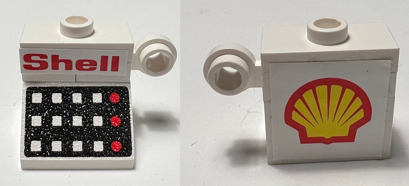 Stickered Assembly 2 x 2 x 1 2/3 with Red 'Shell' and Logo Pattern Model Right Side (Stickers) - Set 6371 - 1 Slope 45 2 x 2 with 12 Buttons and 3 Red Lamps on Black Background Pattern, 1 Plate 1 x 1, 1 Plate, Modified 1 x 1 with Light Attachment - Thin Ring, 1 Plate, Modified 1 x 2 with 1 Stud without Groove (Jumper)