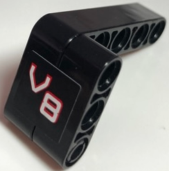 Stickered Assembly 5 x 2 x 3 with Red and White 'V8' Pattern Model Right Side (Sticker) - Set 8682 - 1 Technic, Liftarm Thick 1 x 3, 1 Technic, Liftarm, Modified Bent Thick L-Shape 3 x 5, 1 Technic, Pin with Short Friction Ridges