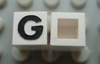 Modulex, Tile 1 x 1 with Black 'G' Pattern (no internal lining)