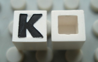 Modulex, Tile 1 x 1 with Black 'K' Pattern (no internal lining)