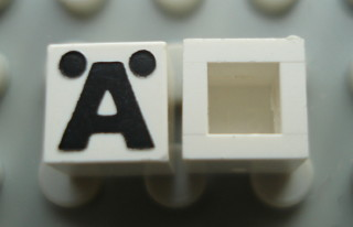 Modulex, Tile 1 x 1 with Black 'Ä' Pattern (no internal lining)