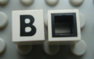 Modulex, Tile 1 x 1 with Black 'B' Pattern (with black lining on sides only)