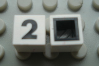 Modulex, Tile 1 x 1 with Black '2' Pattern (with black lining on sides only)