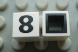 Modulex, Tile 1 x 1 with Black '8' Pattern (with black lining on sides only)