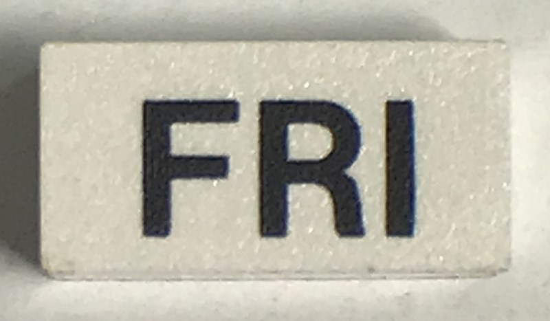 Modulex, Tile 1 x 2 with Black 'FRI' Pattern