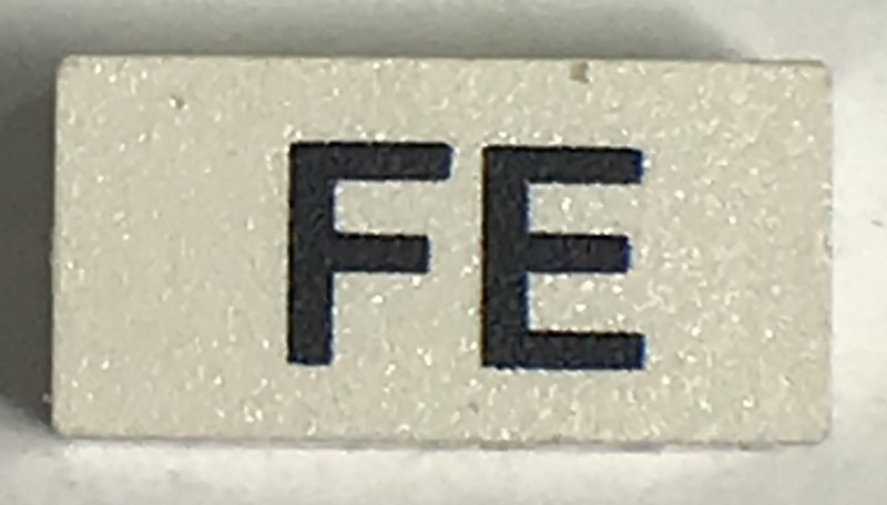 Modulex, Tile 1 x 2 with Black 'FE' Pattern