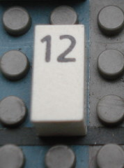 Modulex, Tile 1 x 2 with Black Calendar Day Number '12' Pattern