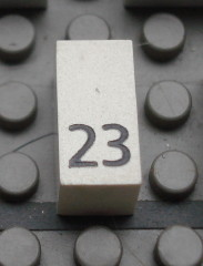 Modulex, Tile 1 x 2 with Black Calendar Day Number '23' Pattern