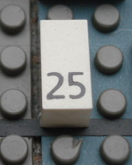 Modulex, Tile 1 x 2 with Black Calendar Day Number '25' Pattern