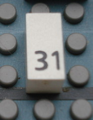 Modulex, Tile 1 x 2 with Black Calendar Day Number '31' Pattern