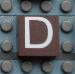 Modulex, Tile 2 x 2 (no Internal Supports) with White Capital Letter D Pattern