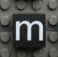 Modulex, Tile 2 x 2 (no Internal Supports) with White Lowercase Letter m Pattern