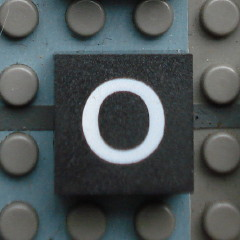 Modulex, Tile 2 x 2 (no Internal Supports) with White Lowercase Letter o Pattern