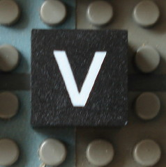 Modulex, Tile 2 x 2 (no Internal Supports) with White Lowercase Letter v Pattern