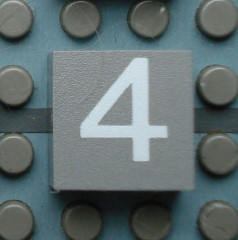 Modulex, Tile 2 x 2 (no Internal Supports) with White Number 4 Pattern