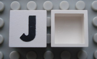 Modulex, Tile 2 x 2 (no Internal Supports) with Black Capital Letter J Pattern