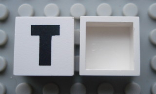 Modulex, Tile 2 x 2 (no Internal Supports) with Black Capital Letter T Pattern