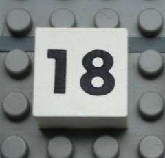 Modulex, Tile 2 x 2 (no Internal Supports) with Black Calendar Week Number 18 Pattern