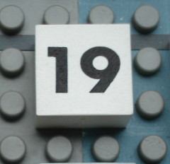 Modulex, Tile 2 x 2 (no Internal Supports) with Black Calendar Week Number 19 Pattern