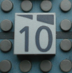 Modulex, Tile 2 x 2 (no Internal Supports) with Dark Gray Slopes and Calendar Week Number 10 Pattern