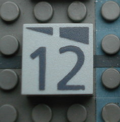 Modulex, Tile 2 x 2 (no Internal Supports) with Dark Gray Slopes and Calendar Week Number 12 Pattern