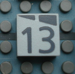Modulex, Tile 2 x 2 (no Internal Supports) with Dark Gray Slopes and Calendar Week Number 13 Pattern