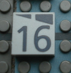 Modulex, Tile 2 x 2 (no Internal Supports) with Dark Gray Slopes and Calendar Week Number 16 Pattern