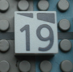 Modulex, Tile 2 x 2 (no Internal Supports) with Dark Gray Slopes and Calendar Week Number 19 Pattern