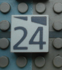 Modulex, Tile 2 x 2 (no Internal Supports) with Dark Gray Slopes and Calendar Week Number 24 Pattern