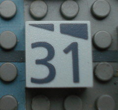 Modulex, Tile 2 x 2 (no Internal Supports) with Dark Gray Slopes and Calendar Week Number 31 Pattern