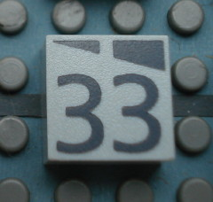 Modulex, Tile 2 x 2 (no Internal Supports) with Dark Gray Slopes and Calendar Week Number 33 Pattern