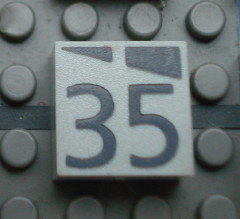 Modulex, Tile 2 x 2 (no Internal Supports) with Dark Gray Slopes and Calendar Week Number 35 Pattern