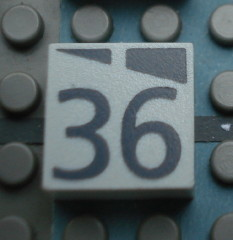 Modulex, Tile 2 x 2 (no Internal Supports) with Dark Gray Slopes and Calendar Week Number 36 Pattern