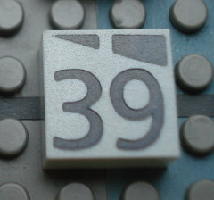 Modulex, Tile 2 x 2 (no Internal Supports) with Dark Gray Slopes and Calendar Week Number 39 Pattern